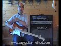 Holding The Guitar