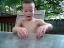 Troy playing with frogs Troy playing with frogs