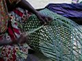 P.P.E (projet pygmee etabe) Pygmy woman at work