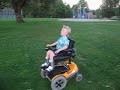 Josh in his power wheelchair