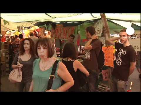 Protesters refuse to move from a Madrid square Protesters refuse to move from a Madrid square