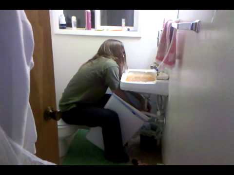 how to unclog bathroom sink vomit