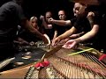 Bowed, etc. piano: http://bit.ly/2ljNq7 ... filament coated in resin. Takes a lot of hands!