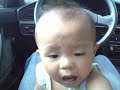 Cute baby boy  playing in daddy's car