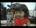 a cute malaysian girl singing !..