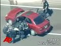 Police K-9 deployment. Criminal grabs baby, dog grabs criminal. Criminal loses.