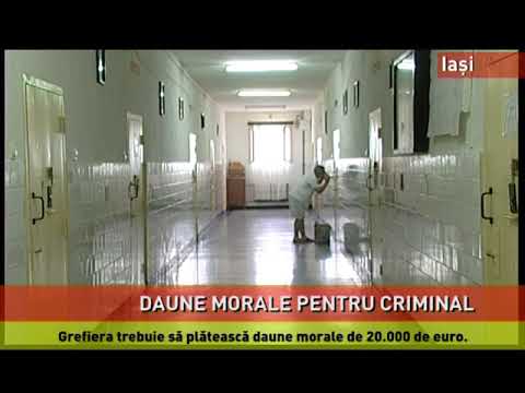 O grefieră din Iași, obligată să plătească daune morale de 20.000 de euro unui criminal