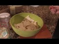 Making tortilla chips from scratch requires cutting either white corn or yellow corn tortillas into large triangles, tossing them in a bit of oil, spreading them out evenly on a cookie sheet and baking them at 400 degrees until golden and crispy. Whip up some homemade tortilla chips with directions from a professional chef in this free video on cooking. Expert: Karen Lasher Bio: Karen Lasher is the chef and owner of 