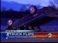 Two injured when truck flips