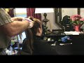 Braiding a ponytail by a student