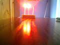 Red 300mW self-made laser lights a match