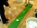 tacada de golfe.......