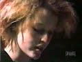 it's a video showing gillian anderson as a teenager in a local tv station, reading 