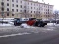 Snöröjning Göteborg 1 - Traktor fyller container med snö