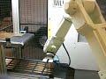 Kawasaki Robot a loading Haas milling machine Kawasaki Robot a loading Haas milling machine
