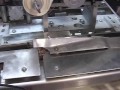 hanamal Square bags line - vertical machine. - with volometric system and carrousel for square bags closing and shrink 