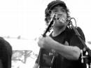 tim easton playing an unplanned set at the offramp stage at comfest 2007 in columbus, oh