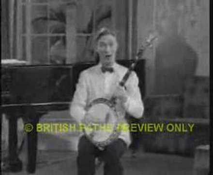 Eddie Peabody playing two banjos