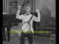 Eddie Peabody playing two banjos