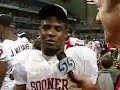 tyler suiters talks to oklahomas reggie smith after they beat missouri for the big 12 in san antonio.