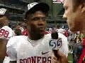 tyler suiters talks to oklahomas reggie smith after they beat missouri for the big 12 in san antonio.