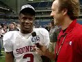 tyler suiters talks to oklahomas reggie smith after they beat missouri for the big 12 in san antonio.