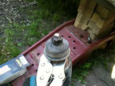 how to remove jk front shocks