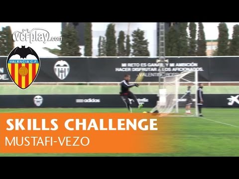Shkodran Mustafi and Ruben Vezo challenge their skills at the end of the training session