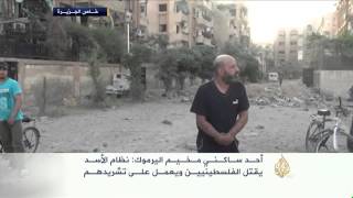 استهداف مخيم اليرموك بالبراميل المتفجرة