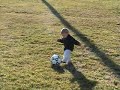 Baby Noah (little brick) dribbling soccer ball