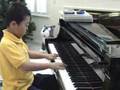 Lawrence, 8 years old, play Mozart Sonata K330 1st mov't