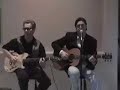 regan wood and bernie hamburger of the acoustic duo pullin' strings perform the james taylor classic, 