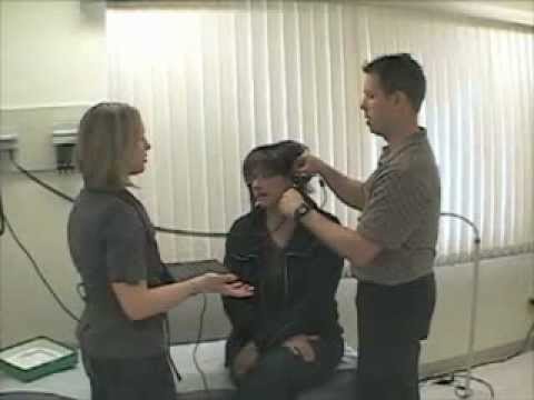 how to perform otoscopic examination