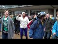 Gathered students burst into a choreographed 