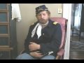 Steve Alexander rescues a kitten while performing as General Custer Re-Enacter.