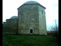 This sixteenth-century foundation consists of two seven-sided structures roughly 50m apart, with the smaller of the two, on the right, containing the still-intact turbe , or tomb , of Ac Yazili Baba himself. A fourteenth-century holy man who subsequently became an object of veneration for local Muslims, Yazili Baba attracted Dervish communities to the area and, although the latter have long-since departed, the Tekke is still a powerful draw for both Muslims and Christians alike. Bulgarians believe it to be the last resting place both of St Athanasius (patron saint of lost sheep), and of the country's first Christian ruler, Knyaz Boris I, and pious shepherds used to sacrifice hundreds of sheep here on St George's Day - hence the name Obrochishte, which means 