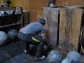 Brian Ward loading a 148 lb stone onto a 50