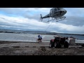 AS350 picking up a quad on a longline