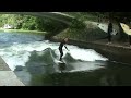 Surfing on the Isarkanal, Thalkirchen, Munich Surfing on the Isarkanal, Thalkirchen, Munich