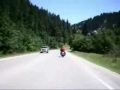 Deer nearly miss biker