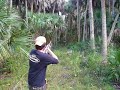 shooting a gun at the hunting camp shooting a gun at the hunting camp