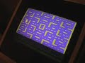 Arcade cabinet running retro game consoles