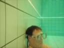 Sitting in the pool under water Sitting in the pool under water