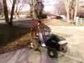 videos de dumbass riding a wheelie on a lawn mower