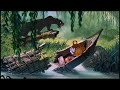 the jungle book - baloo bear and mowgli sing 'the bare necessities'