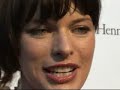 celebrities on amfar red carpet- milla jovovich, hofit golan, sharon stone, roberto cavalli, victoria silvsted, petra nemcova, clotilde courau