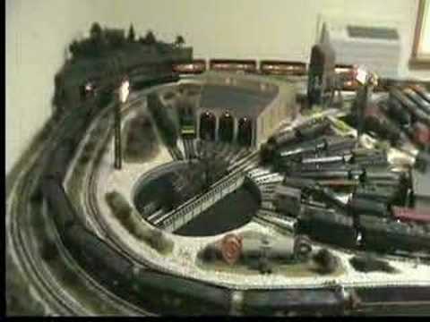 layout - This video shows the layout going from start up to full operation with four trains running. Trains in order of appearance: Lionel SP Daylight pulling William...