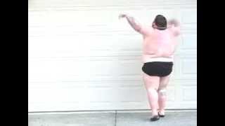 Click to View : Is it the fat or is he just really bad on timing the beat