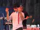 Joe Jonas Putting His Tie on His Head