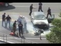 (ENTIRE FOOTAGE) Motorcyclist under burning car: RESCUED by crowd of bystanders